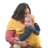 Nalakai Ring Sling close-bonding scene showing hands-free baby contact.