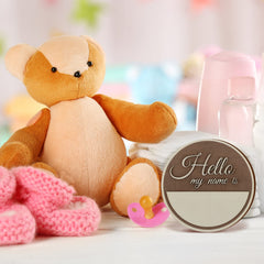 Namalu Hello World sign name-field panel for recording baby's name and birth date.
