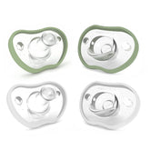 Nanobébé pacifier 0-3m with orthodontic curve fits baby's face comfortably for calm feeding sessions.
