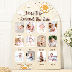 Naozinebi first trip around the sun photo board—sun design centerpiece for baby's milestone photos.