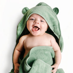 Natemia hooded baby towel folded view highlights compact storage and gifting appeal.