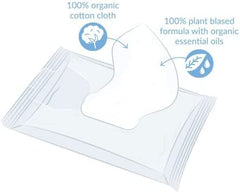 Natracare baby wipes 50ct in use on baby's face for cleansing.