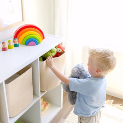 NaturalCozy 11-inch cube stores toys neatly on a shelf