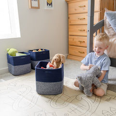 NaturalCozy 3-pack cube storage bins stacked neatly in a closet.