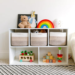 NaturalCozy nursery setup with 9x9x7 cubes neatly organizing toys and blankets.