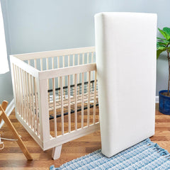 Naturepedic Breathe Thru pad with 3D mesh for breathable, cool sleep.
