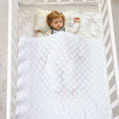 Neiwech cotton cellular baby blanket in crib use for cozy nursery time