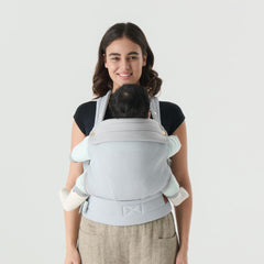 NEST BLANCHE baby carrier back-strap view emphasizes even weight distribution.