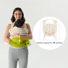 Nest Blanche baby carrier hip-carry in houndstooth for ergonomic support on the go