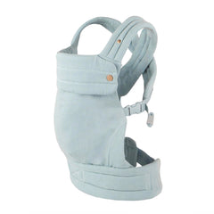 Nest Blanche denim baby carrier front view showing hands-free use.
