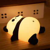 NesveCit Panda Night Light on glows softly for bedtime stories.