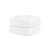 Newton Baby fitted crib sheet close-up shows soft organic cotton texture for baby comfort