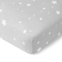Newton Baby fitted crib sheet with secure elastic fit on standard crib