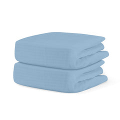 Newton Baby Sky Blue fitted crib sheet fabric close-up shows soft organic cotton.