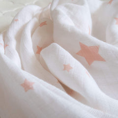 Newton Baby Fitted sheet elastic edge demonstrates snug crib fit