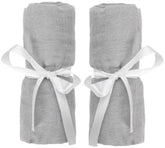 Newton Baby fitted sheet for travel crib showing soft muslin and breathable comfort.