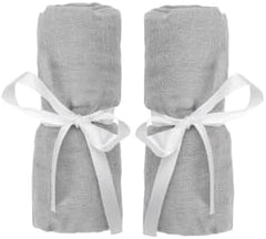 Newton Baby fitted sheet for travel crib showing soft muslin and breathable comfort.
