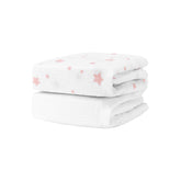 Newton Baby Stardust print blush coral sheet shows breathable organic muslin for peaceful sleep