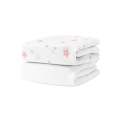 Newton Baby Stardust print blush coral sheet shows breathable organic muslin for peaceful sleep