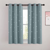 NICETOWN star blackout curtains on window provide cozy room-darkening ambience for kids room
