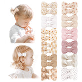 Niceye baby hair clips 24-pcs flatlay showing versatile outfits and secure hold.