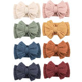 Niceye baby headband bow white with soft stretchy nylon for gentle everyday wear.