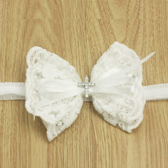 Nihao Baby baptism ceremony outfit inspiration with bow headband