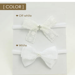 Nihao Baby newborn headband with soft nylon stretch band for gentle wear.