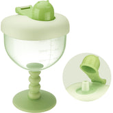 NiHome 6oz baby goblet cup with lid shown in green, spill-free on the go