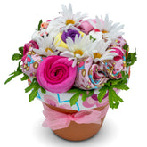 Nikki's Gift Baskets Deluxe Baby Blossom 6-piece set demonstrates newborn comfort.