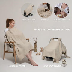 Nilsa car seat cover in use shielding baby from sun and bugs.