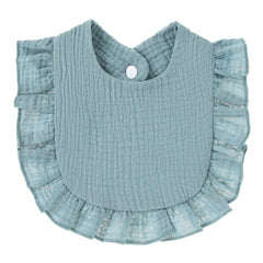 Nishine adjustable-neck bib demonstrates secure fit for growing babies.