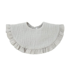 Nishine muslin bandana bibs worn with outfits for everyday style.