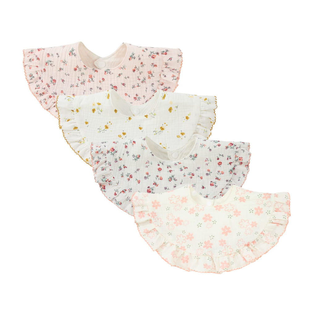 Nishine flower-set bibs flat lay reveals four colors for stylish drool protection