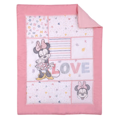 NoJo Minnie Mouse patchwork closeup shows vibrant stripes and dots for nursery charm