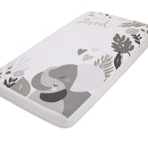 NoJo Elephant Hugs crib sheet closeup shows soft cotton texture for gentle nights.
