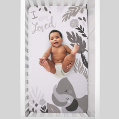 NoJo Elephant Hugs crib sheet design with elephants and I am loved message for cozy photo ops.