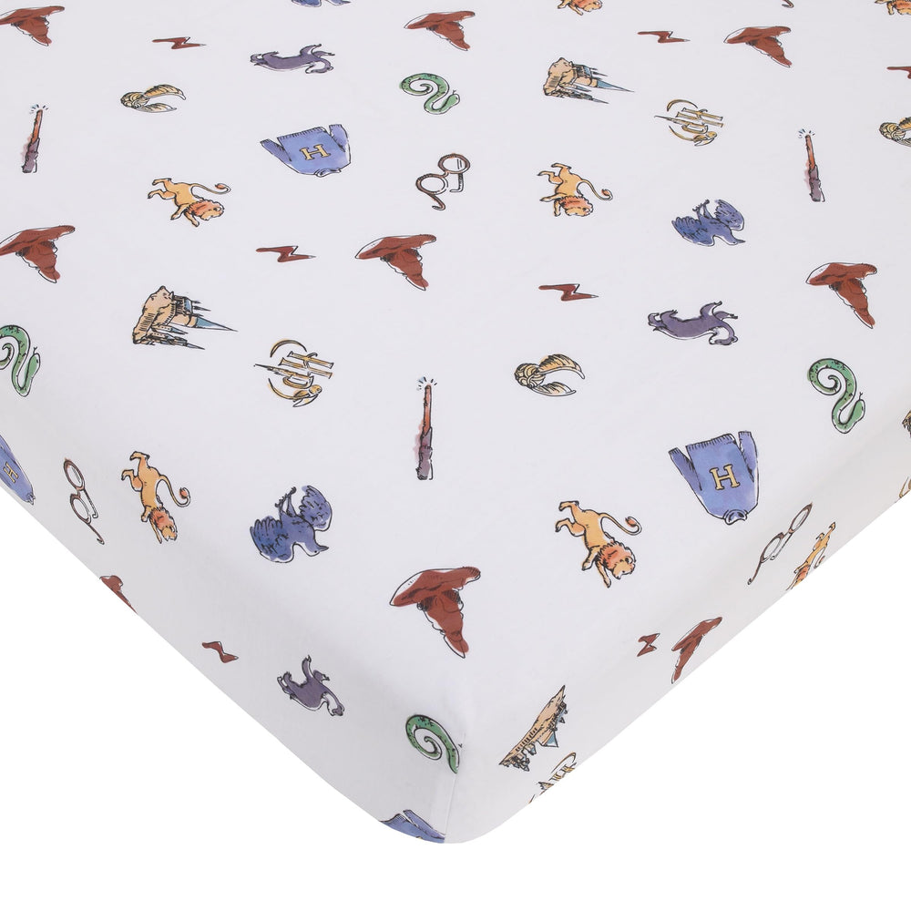 NoJo Harry Potter Welcome Little Wizard crib sheet folded-edge close-up, soft cotton comfort.