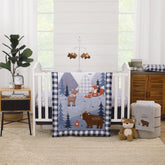 NoJo Little Love comforter featuring forest animals with navy buffalo check for a cozy nursery focal point