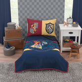 NoJo Harry Potter bed set comforter on toddler bed with Hogwarts colors for cozy sleep