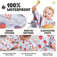 Nombear smock bib wipe-clean image demonstrates quick cleanup after meals.