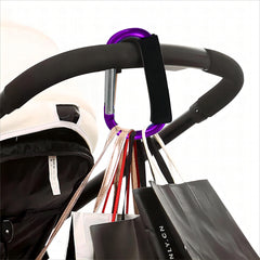 Noneea easy-attach clip demonstrates one-handed operation for busy parents.