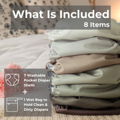 Nora's Nursery large-pocket diaper snaps show adjustable fit for easy on-the-go changes.