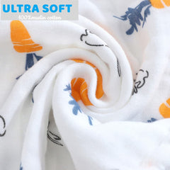 Norinori muslin burp cloths displayed on a table showing generous coverage for spills.