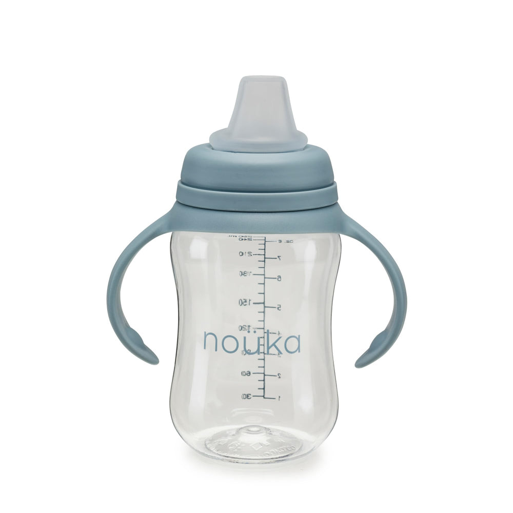 noüka soft spout sippy cup with wave design promotes gentle sipping for toddlers.