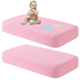 NTBAY mini crib mattress protector closeup showing snug fit and quiet fabric for restful sleep
