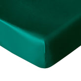 NTBAY Silk Satin Fitted Crib Sheet in dark green with silky, cooling comfort.