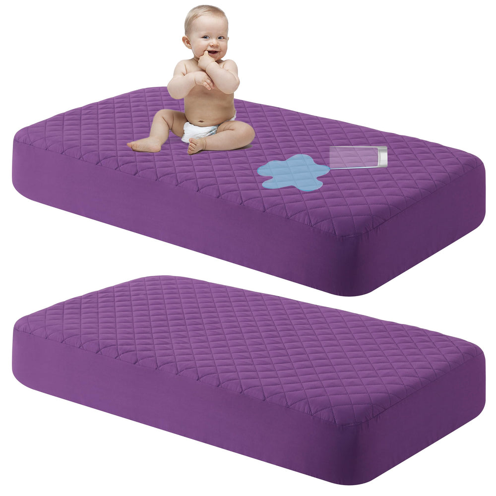 NTBAY waterproof mini-crib protector close-up showing quilted surface protecting against spills.
