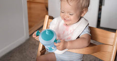 NUK Evolution Soft Spout Learner Cup interchangeable lid display for growing child.