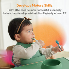 NumNum pre-spoon handle closeup showing thick contoured grip for little hands.